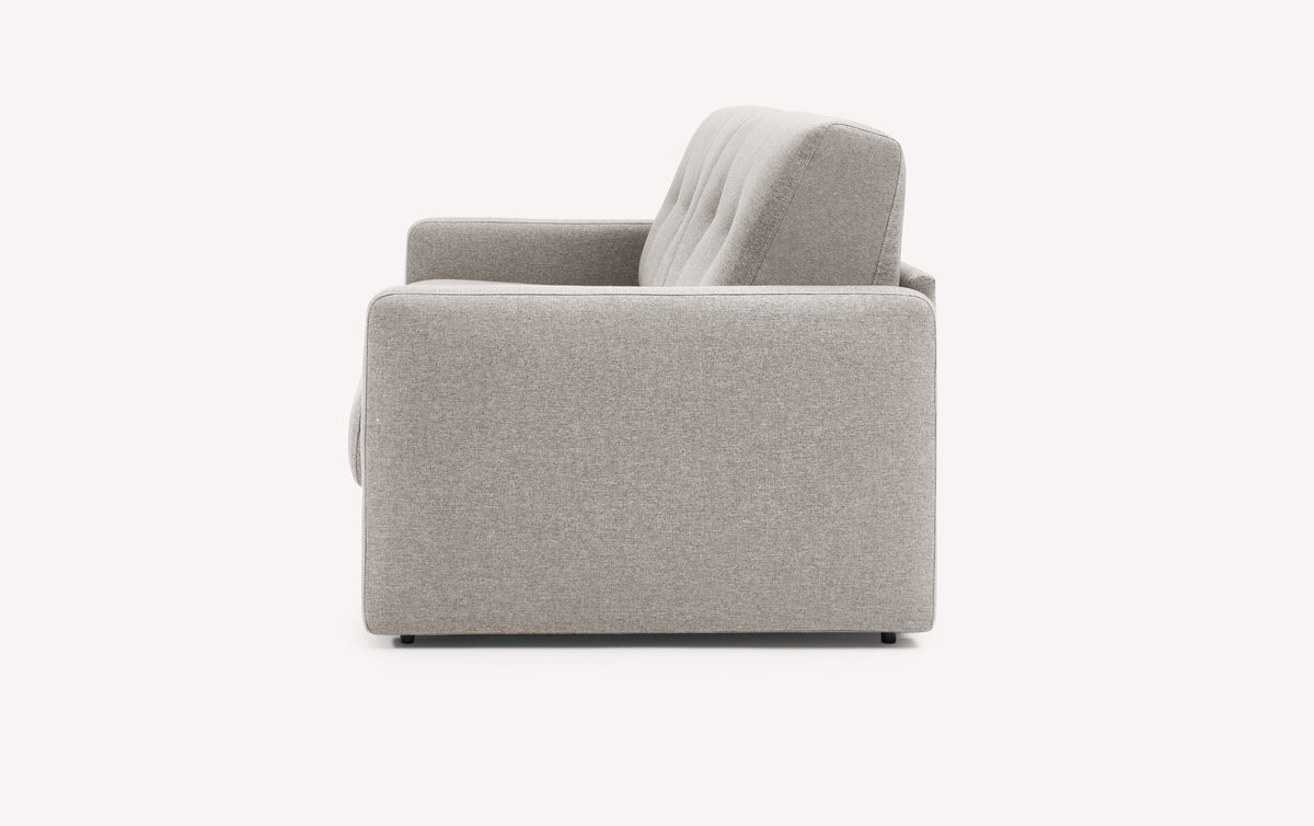 Canapé convertible Ned en tissu Denver naturel, vue latérale montrant le design moderne et les accoudoirs rembourrés