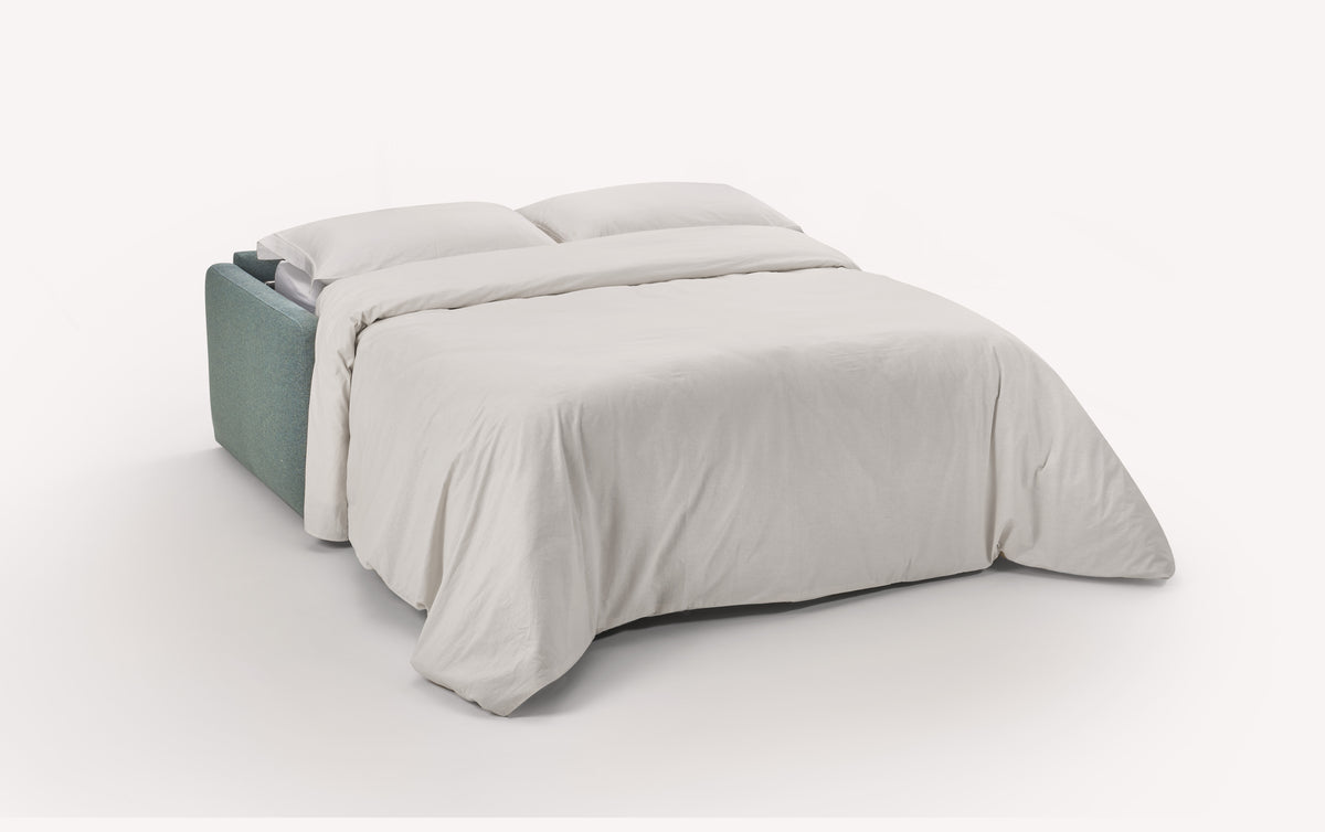 Canapé convertible ouvert en tissu Denver couleur lagon, avec draps blancs