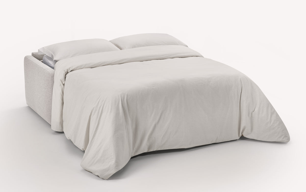 Canapé convertible ouvert en tissu Denver naturel, avec draps et oreillers blancs