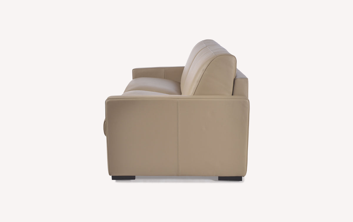 Canapé convertible en cuir mastic vu de côté, design moderne et élégant
