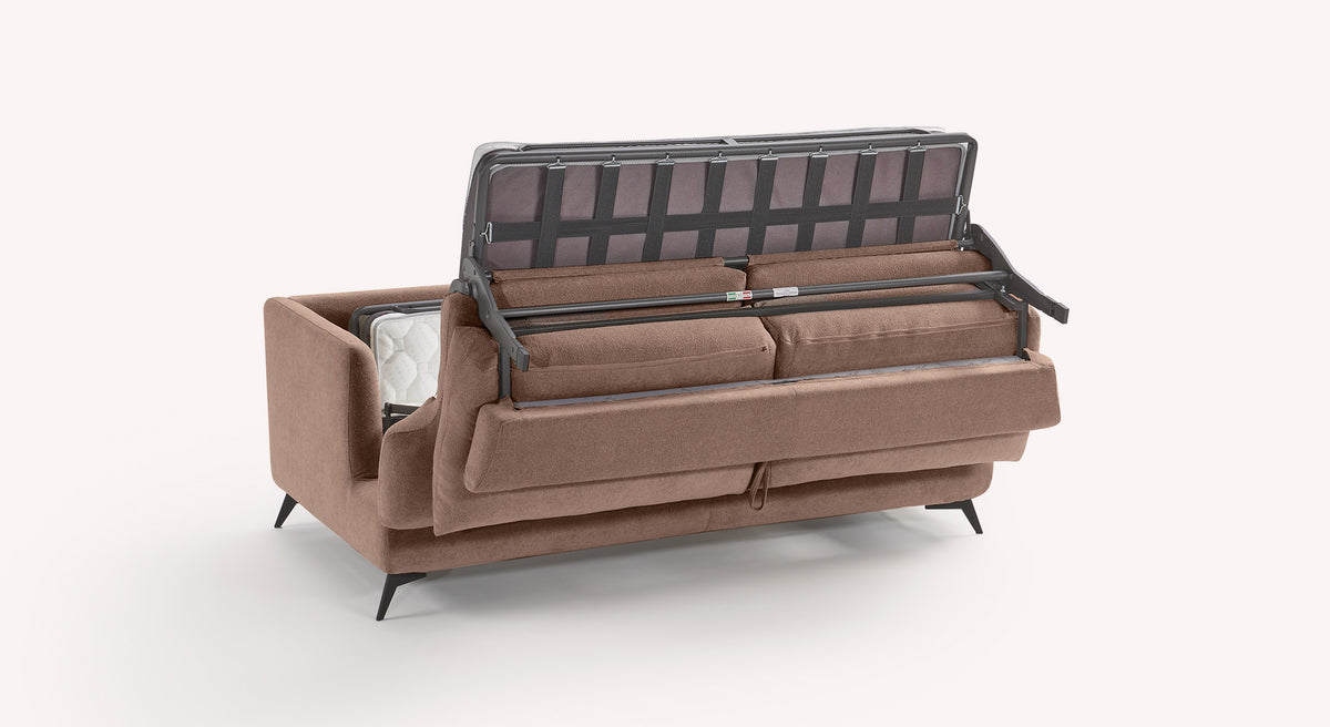 Canapé convertible en tissu vieux rose, modèle Queen, avec mécanisme de dépliage visible