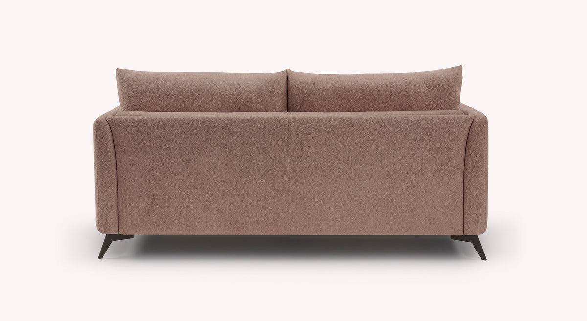 Canapé convertible en tissu vieux rose, vu de dos, avec pieds noirs