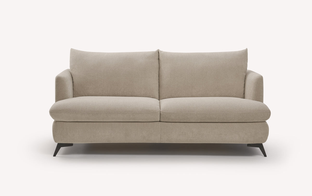 Canapé convertible en tissu beige, modèle Queen Innuendo, avec accoudoirs arrondis et pieds noirs
