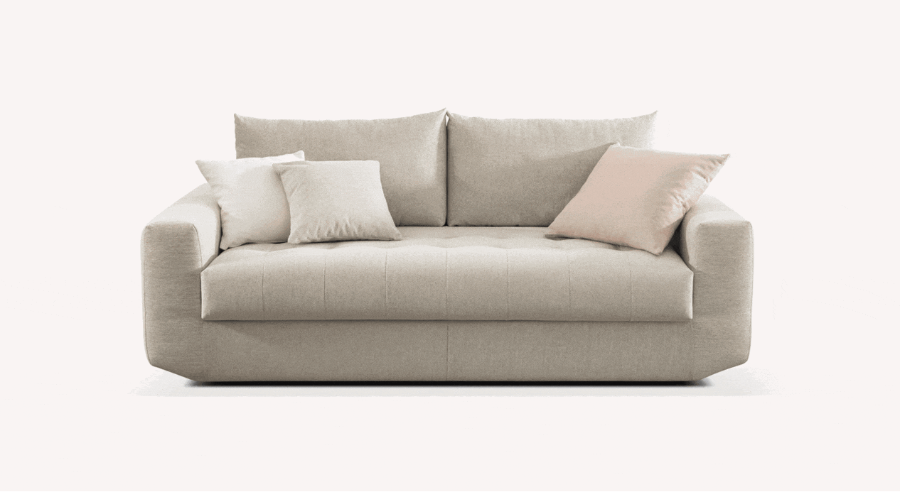Canapé convertible STELLA Gemma Avoine en tissu beige clair avec coussins assortis, design moderne et épuré adapté pour un couchage quotidien confortable.