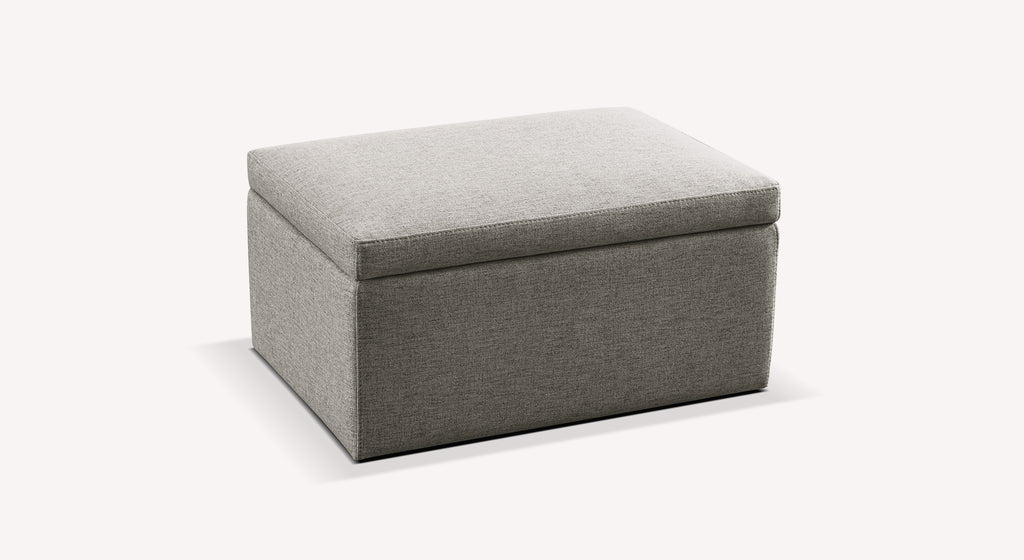Pouf Coffre VIENNA Joint Etain en tissu gris, élégant et fonctionnel, offrant un espace de rangement pratique tout en complétant parfaitement un canapé convertible ou un lit coffre.