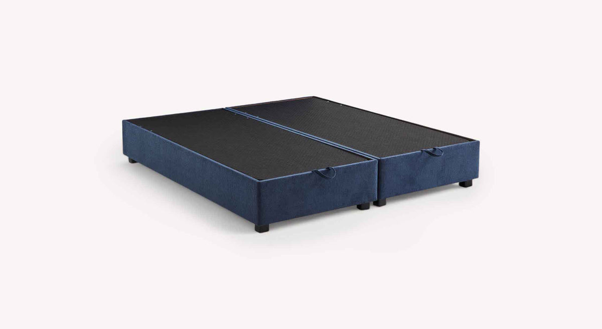 Lit coffre NINA Margon Basic Marine en tissu bleu marine avec espace de rangement intégré, design élégant et pratique pour optimiser l'espace de la chambre.