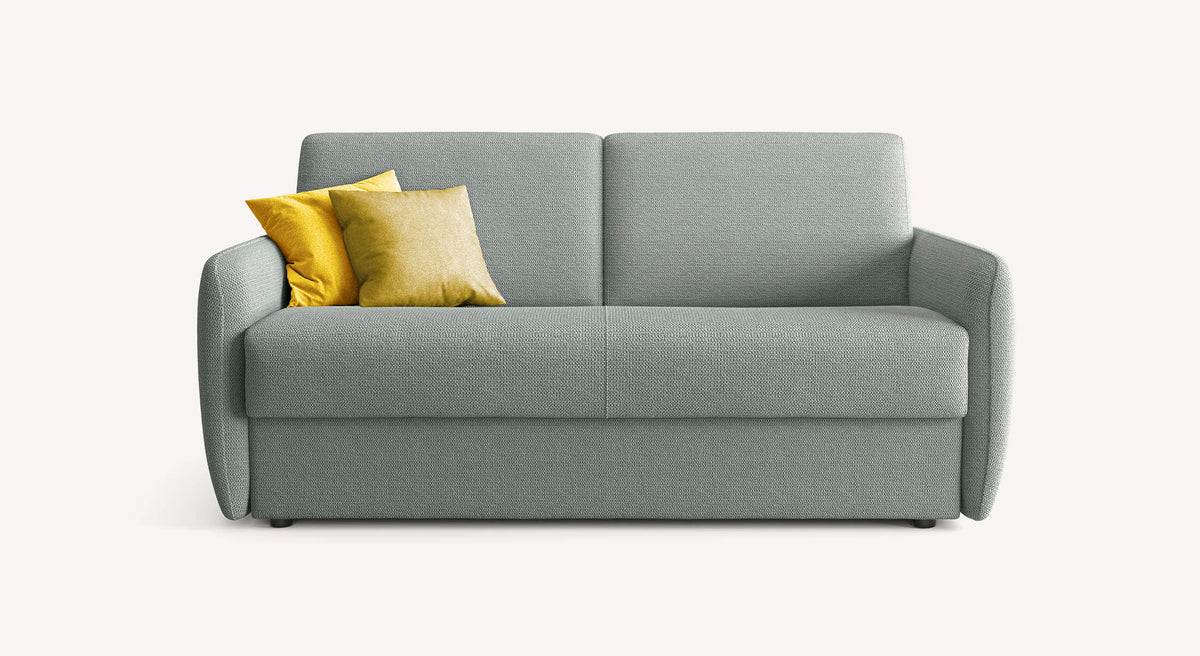 Canapé convertible NEVADA Aragon Etain en tissu gris clair avec deux coussins jaunes, design épuré idéal pour un couchage quotidien confortable.