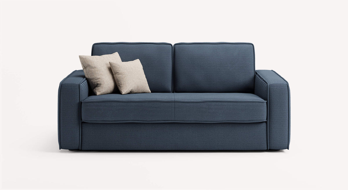 Canapé convertible Ridley Lincoln bleu nuit avec deux coussins beiges
