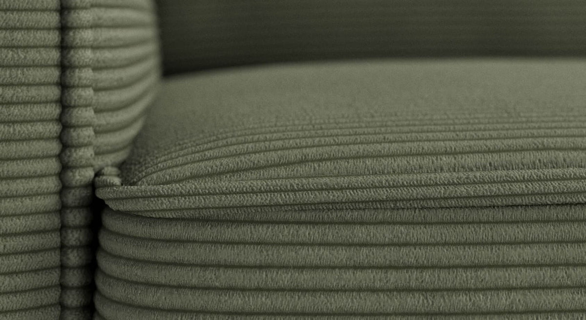 Gros plan sur le tissu côtelé d'un canapé convertible Ridley Lincoln, couleur vert olive
